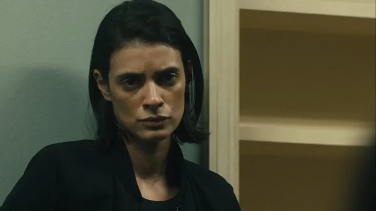 Close-up portrait of Laysla De Oliveira as Cruz Manuelos in a black jacket looking solemn in Special Ops: Lioness.