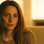 Close-up portrait of Genesis Rodriguez as Josephina Carrillo looking contemplative in Special Ops: Lioness.