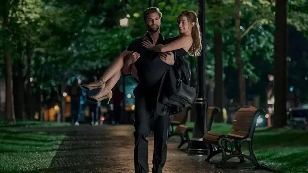 Actors Lili Reinhart and Tom Bateman portraying Olive Smith and Dr. Adam Carlsen in the film adaptation of The Love Hypothesis
