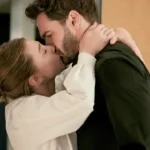 Lili Reinhart as Olive Smith and Tom Bateman as Adam Carlsen in the film adaptation of Ali Hazelwood's bestseller The Love Hypothesis, which premiered on Prime Video.