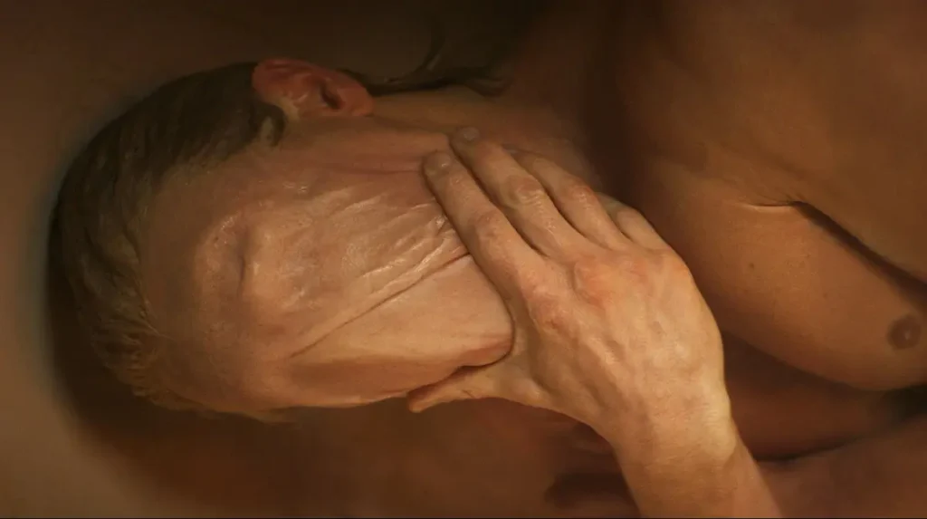Tom Rhys Harries as Matt Hagen in a scene from the DC Studios body-horror film Clayface (2026)