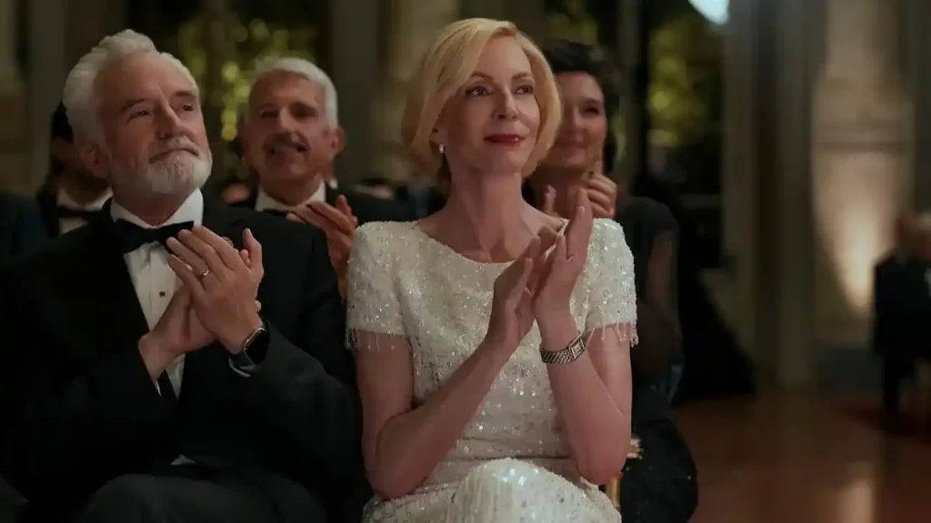 Allison Janney as Grace Penn wearing a white sequin-embellished short-sleeve gown by Jenny Packham (with an altered neckline) in Netflix's The Diplomat