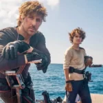 Ryan Gosling and Flynn Gray are featured on the set of the upcoming film Star Wars: Starfighter (2027), directed by Shawn Levy.