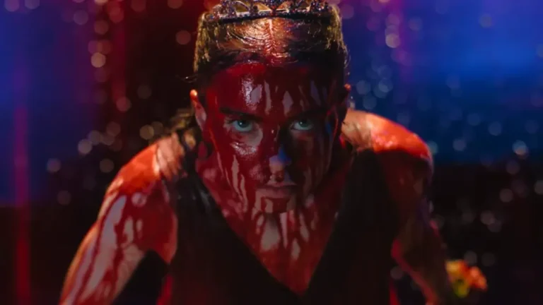 Summer H. Howell as Carrie White covered in pig's blood during the prom massacre scene in Mike Flanagan's 2026 television adaptation of Carrie