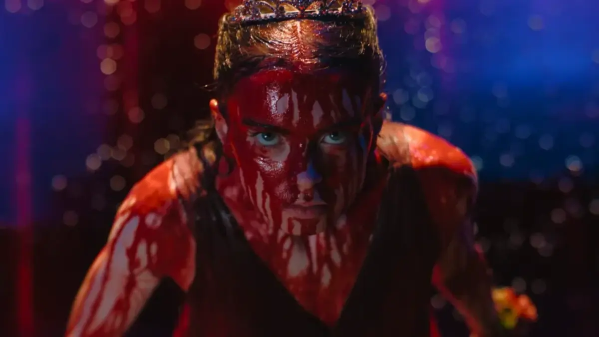 Summer H. Howell as Carrie White covered in pig's blood during the prom massacre scene in Mike Flanagan's 2026 television adaptation of Carrie