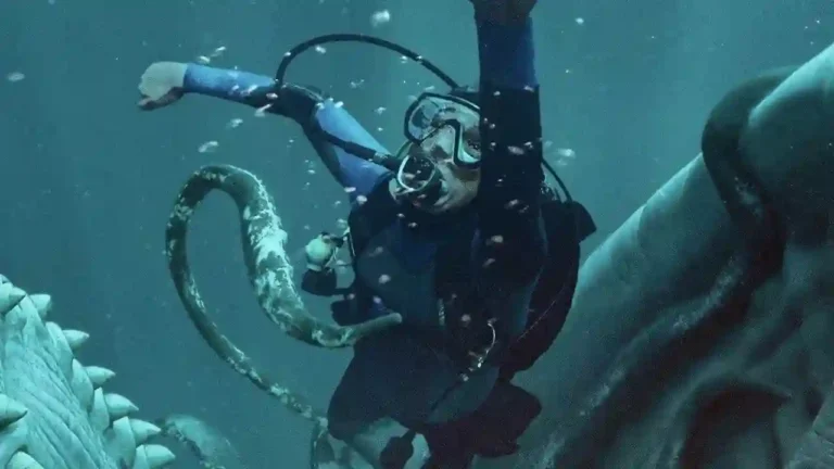 Austin Abrams playing scuba diver Jay being swallowed by a sperm whale in the survival thriller film Whalefall (2026), directed by Brian Duffield